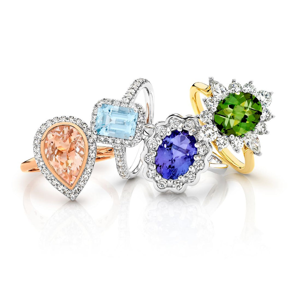 Gemstone jewellery collection featuring sapphire, ruby, emerald, tanzanite, citrine and tourmaline rings, necklaces, and earrings.