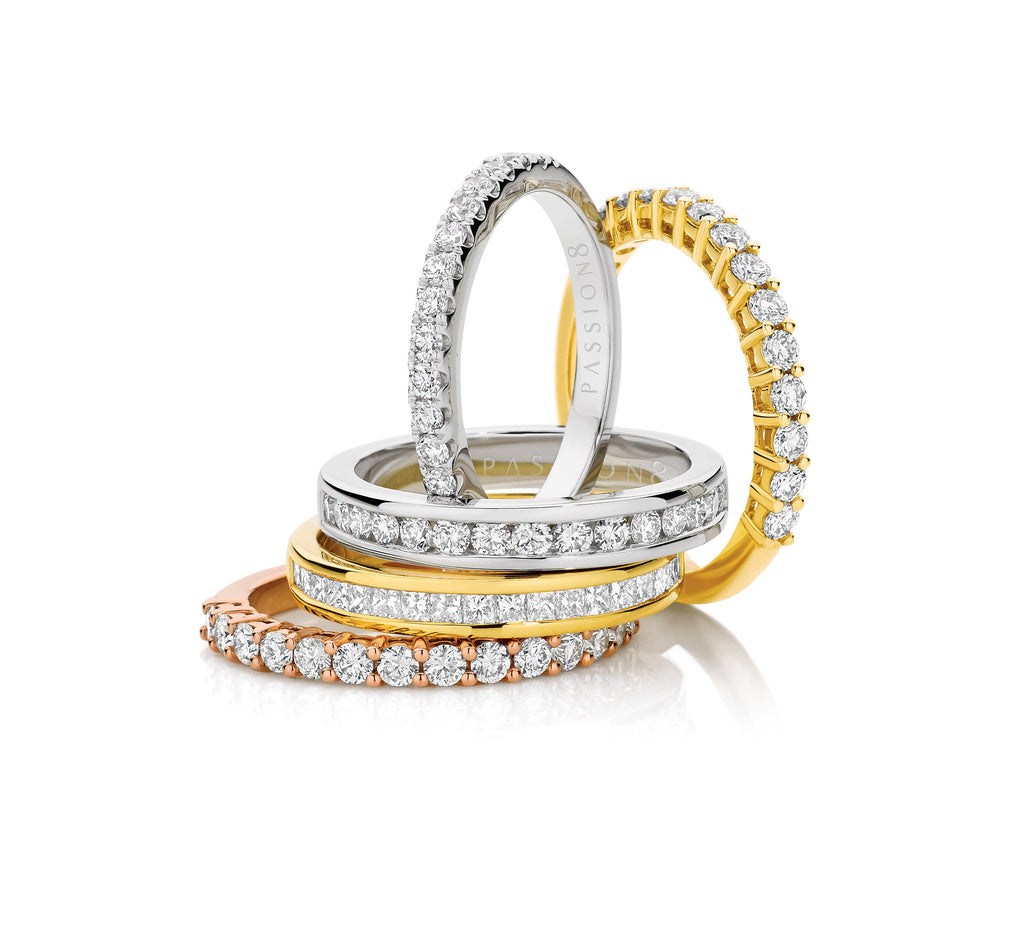 Women's wedding and eternity bands in yellow, white or rose gold, featuring mined & lab diamonds.