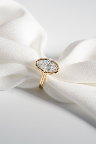 Moval Bezel Set Yellow Gold Engaement Ring