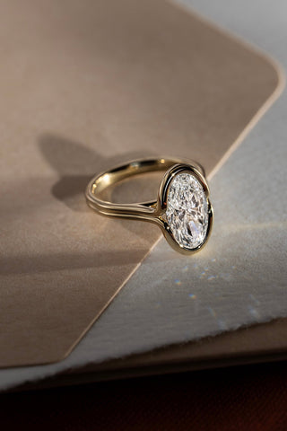 Moval Bezel Set Engagement Ring Yellow Gold