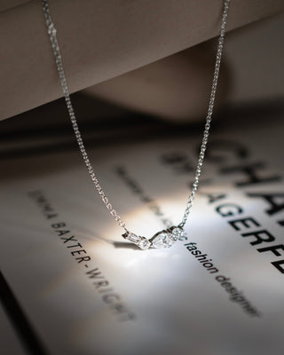 Johanna 9k white gold diamond bar cluster necklace with pear, baguette and round brilliant natural diamonds