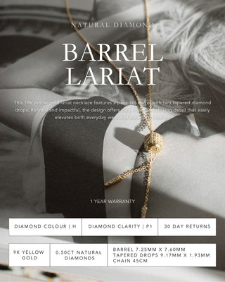 Uri 9k yellow gold lariat necklace with diamond-set barrel and tapered diamond drops