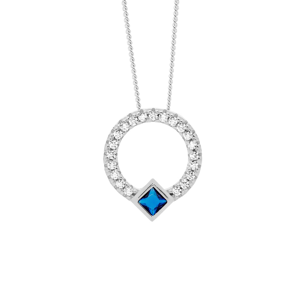 Sterling Silver Open Circle Pendant With White & Dark Blue Cubic Zirconias  